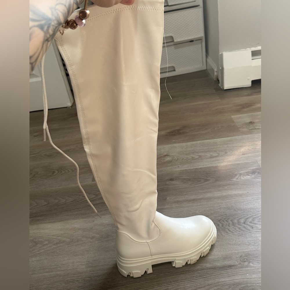 Thigh high white boots